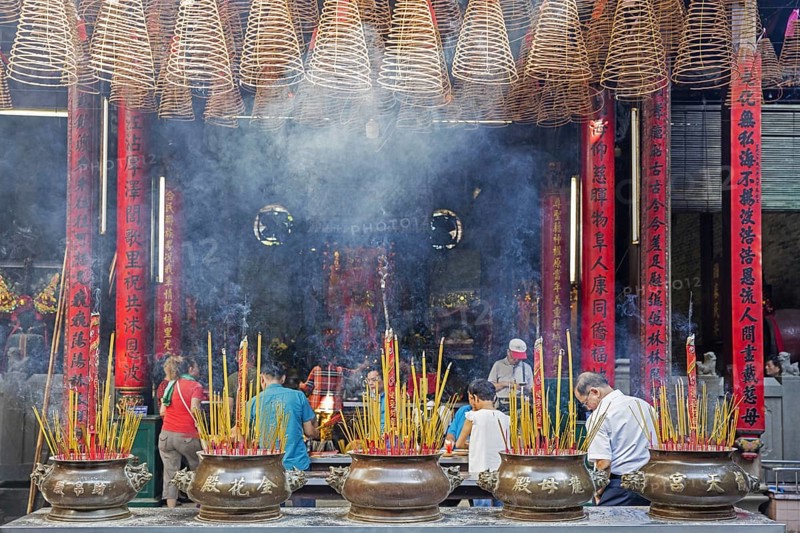 Burning incense sticks and spirals at the Thien Hau Temple, Ba Thien Hau Pagoda for Chinese Goddess of Sea, Mazu, in Ho Chi Minh City, Vietnam, Asia