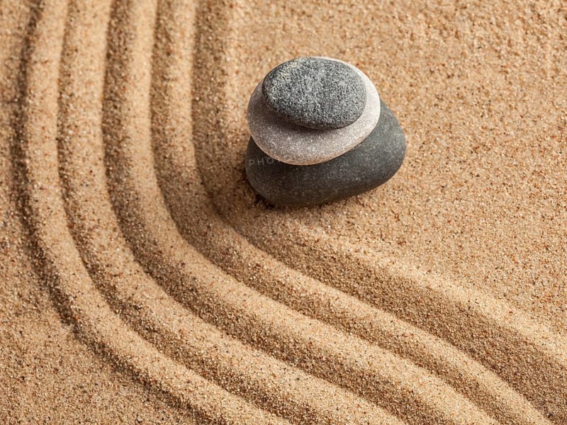 Japanese Zen stone garden, relaxation, meditation, simplicity and balance concept, pebbles and raked sand tranquil calm scene