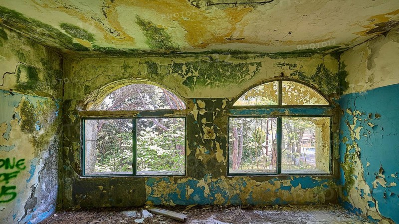 Dilapidated arched windows in an abandoned building with traces of decay and blue walls, Lost Place, Former Santorium, Tuberculosis Centre 1947-1970, Former Italian Colonial Settlement, Eleousa, Campochiaro, Rhodes, Dodecanese, Greek Islands, Greece, Europe