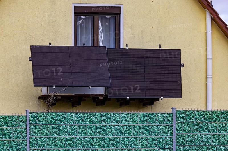 Plastic fence in leaf look on a detached house. Balcony power station. Stuttgart, Baden-Württemberg, Germany, Europe
