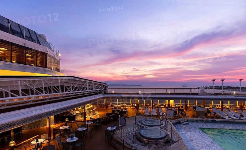 Cruise ship at sunset on vacation around Caribbean islands and Panama Canal in Central America