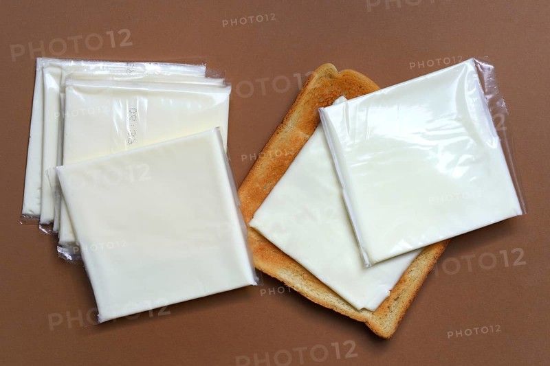 Cheese slices with toast, processed cheese in packaging