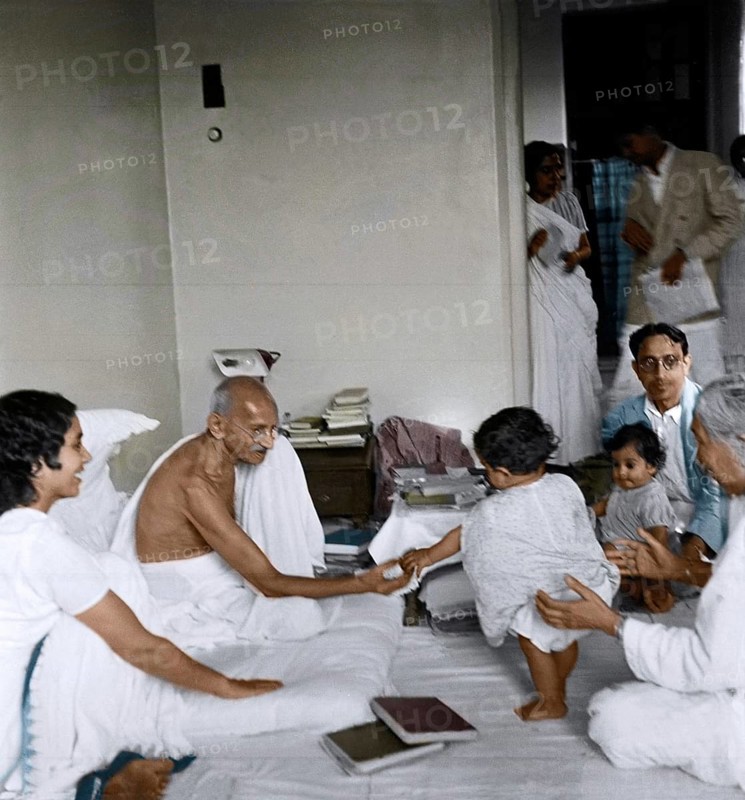 Mahatma Gandhi playing with child, Birla House, Mumbai, Maharashtra, India, Asia, June 1945, Asia