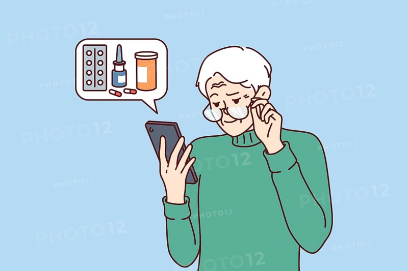 Elderly man orders medicines for home delivery using mobile phone from pharmacy application. Pensioner reads recommendations of ministry of health on use of medicines to treat diseases