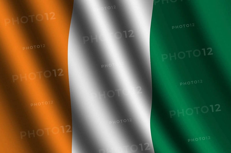 The Republic of Ivory Coast flag flying in the wind