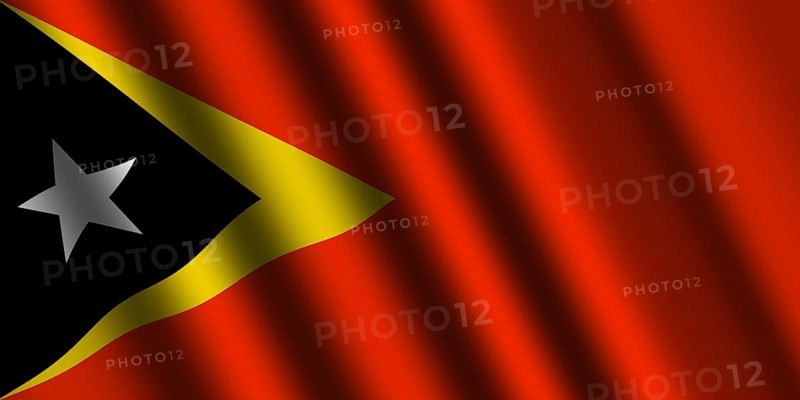 The East Timor flag flying in the wind