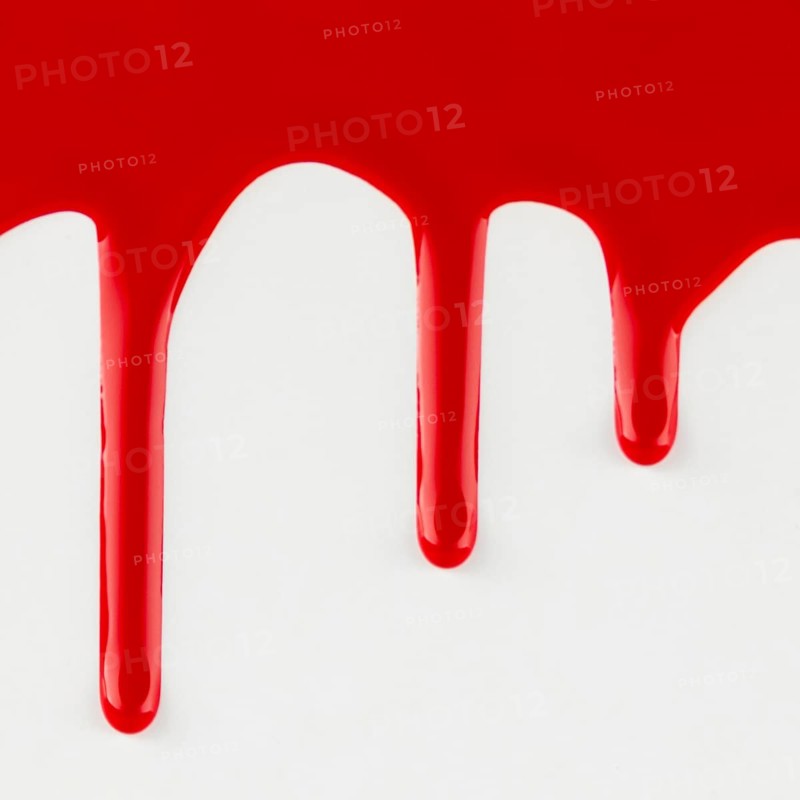 Red dripping paint white background