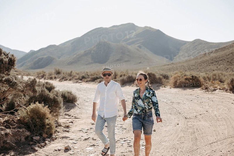 Couple walking in a South African landscape, near Cape Town