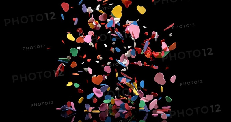 Hearts for Valentine's Day Party Exploding on Black Background
