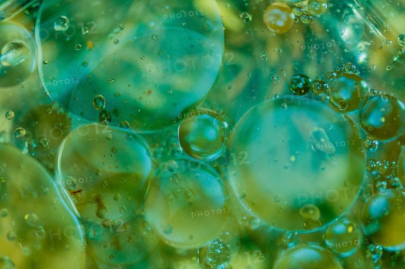 Abstract oil in water using natural light in blue and green tones. Good for wallpaper or background