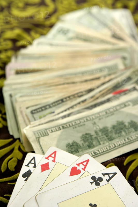 Dollar notes and poker cards, gambler tools recreation
