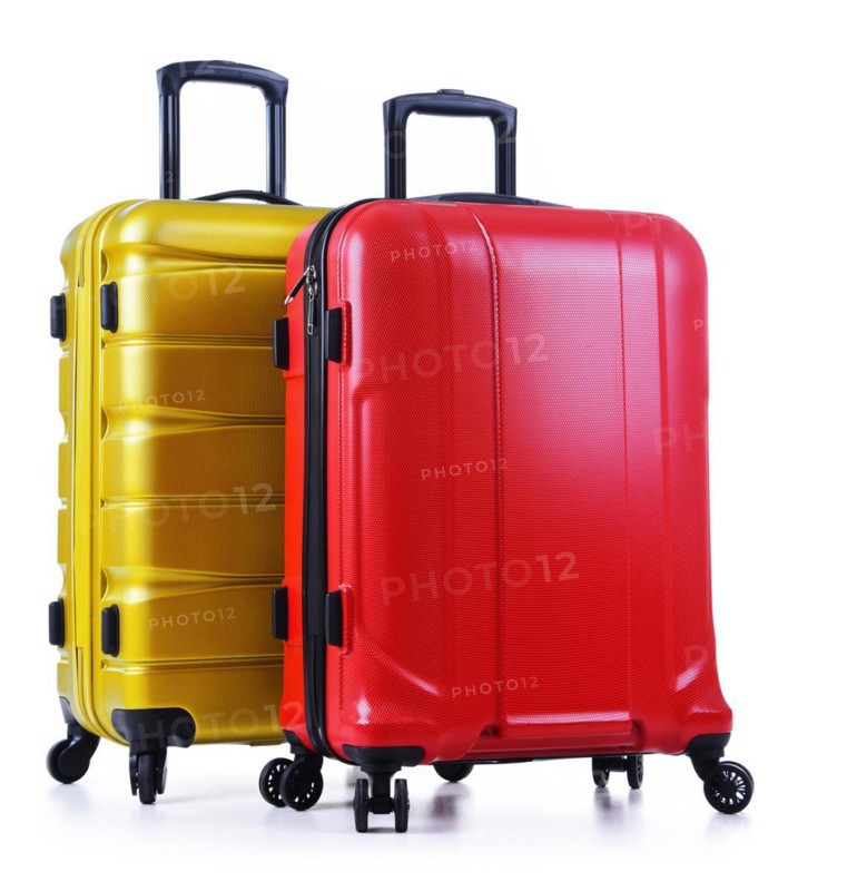 Travel suitcases isolated on white background