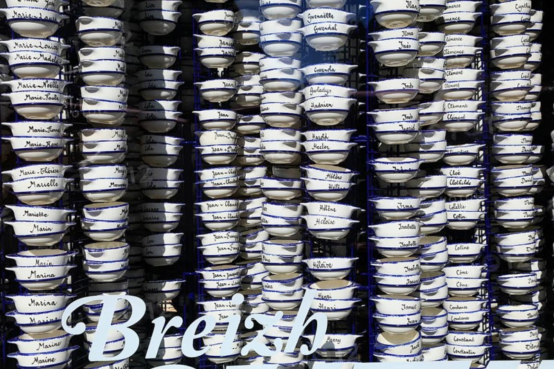 Pottery bowls with first names in the window of a souvenir shop, old town of Vannes, Breton Gwened, Morbihan department, Brittany Breizh region, France, Europe