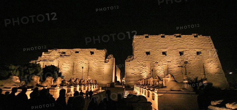 Illuminated great Amun temple of Karnak at night, Luxor, Egypt, Africa