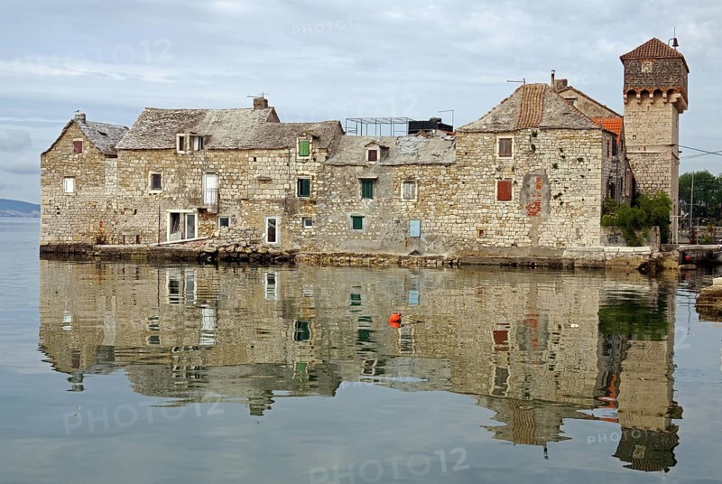Old fortification from the Mediterranean reflected in the water, town of Kastela, Split, Dalmatia, Croatia, Europe