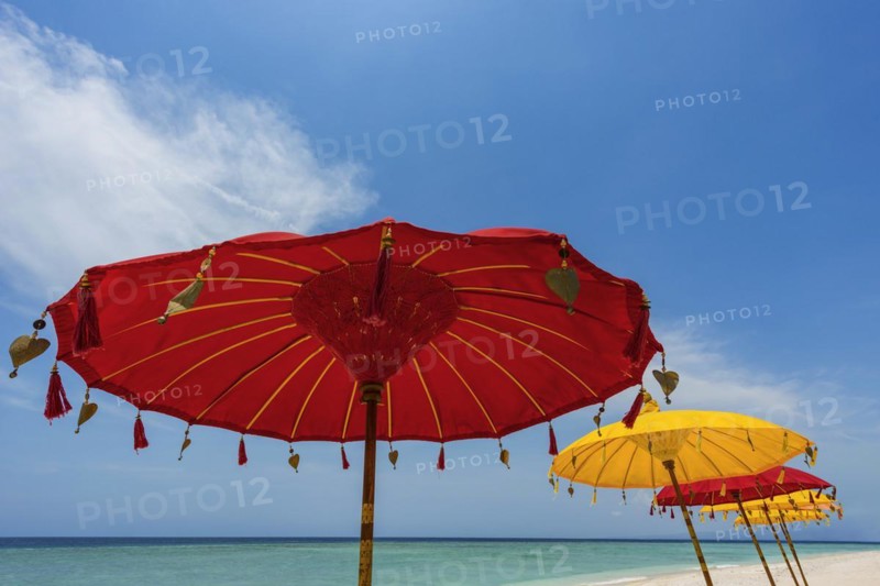 Traditional Balinese temple sunshade as parasol, Hinduism, symbol, beach holiday, protection, sun protection, Balinese, culture, red, yellow, sun, relaxation, relax, blue sky, cliché, holiday cliché, holiday feeling, holiday mood, spa, relax, chill out, shade, shade dispenser, decorated, summer, long-distance travel, exotic, holiday idyll, paradisiacal, water, sea, ocean, coast, travel, holiday, tourism, sea view, Asian, Bali, Indonesia, Asia