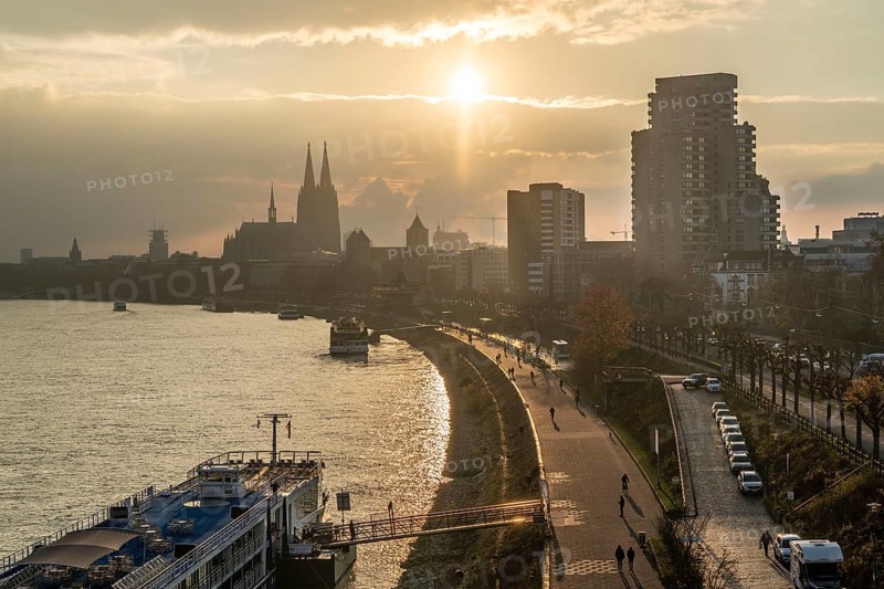 The Rhine near Cologne, sunset, Cologne Cathedral, cargo ship, North Rhine-Westphalia, Germany, Europe