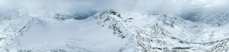 Aerial view, Snowy mountain landscape in fog, Ortler group, Trento, Italy, Europe