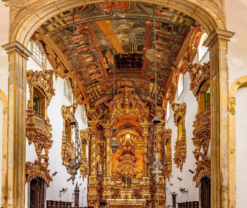 Interior and altar of a historic baroque church richly decorated with gold leaf ornaments and frescoes in city of Recife, Recife, Pernambuco, Brazil, South America