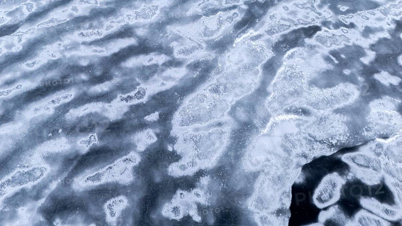 Frozen lake in early winter. Region of La Mauricie. Province of Quebec. Canada