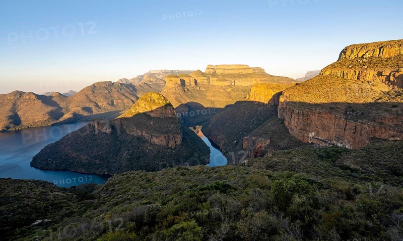 Sunset at Blyde River Canyon with Three Rondawels peak, view of canyon with Blyde River and Mesa Mountains in the evening light, canyon landscape, Panorama Route, Mpumalanga, South Africa, Africa