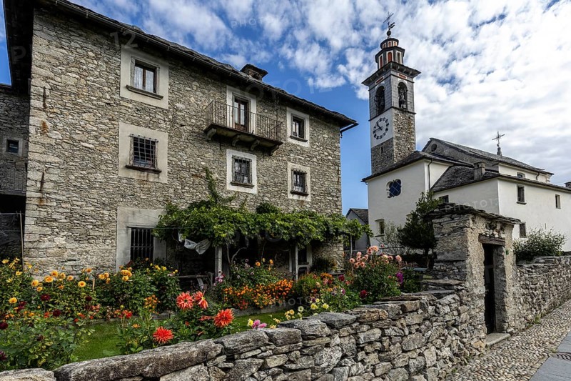 View of the village, typical Ticino stone houses in the mountain village of Rasa, Centovalli, Canton Ticino, Switzerland, Europe