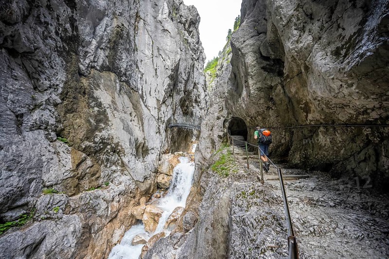 Hammersbach mountain stream in a canyon, mountaineer on a hiking trail in a gorge, Höllentalklamm, Höllental, Bavaria, Germany, Europe