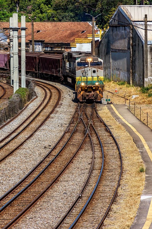 Train loaded with iron ore crossing the city in Minas Gerais, Brazil, Belo Horizonte, Minas Gerais, Brazil, South America