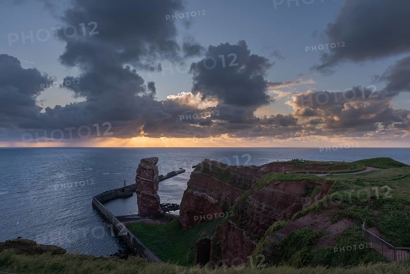 Evening shot, Lange Anna Felsen, red sandstone cliff, Lummenfelsen, cloudy sky, Helgoland Oberland, Helgoland, Schleswig-Holstein, Germany, Europe