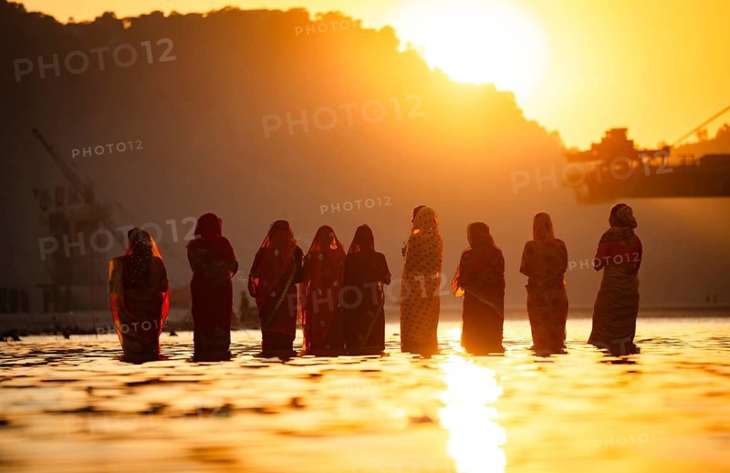 Hindu devotees perform rituals as they offer prayers to the Sun god in the bank of Brahmaputra river on the occasion of the 'Chhath Puja' festival in Guwahati, Assam, India on 7 November 2024. Chhath Puja is a significant Hindu festival celebrated primarily in the Indian states of Bihar, Jharkhand, Uttar Pradesh, and in Nepal. Dedicated to the worship of the Sun God (Surya) and his wife Usha (also referred to as Chhathi Maiya), this festival seeks blessings for prosperity, health, and longevity