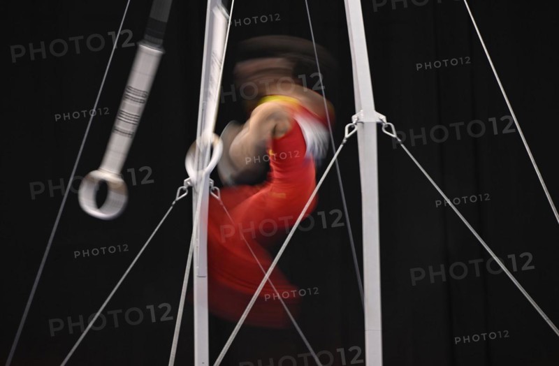 Gymnastics, artistic gymnastics, gymnasts, men, feature, movement, movement effect, wipe effect, rings, EnBW DTB-Pokal 2024, Porsche Arena, Stuttgart, Baden-Württemberg, Germany, Europe