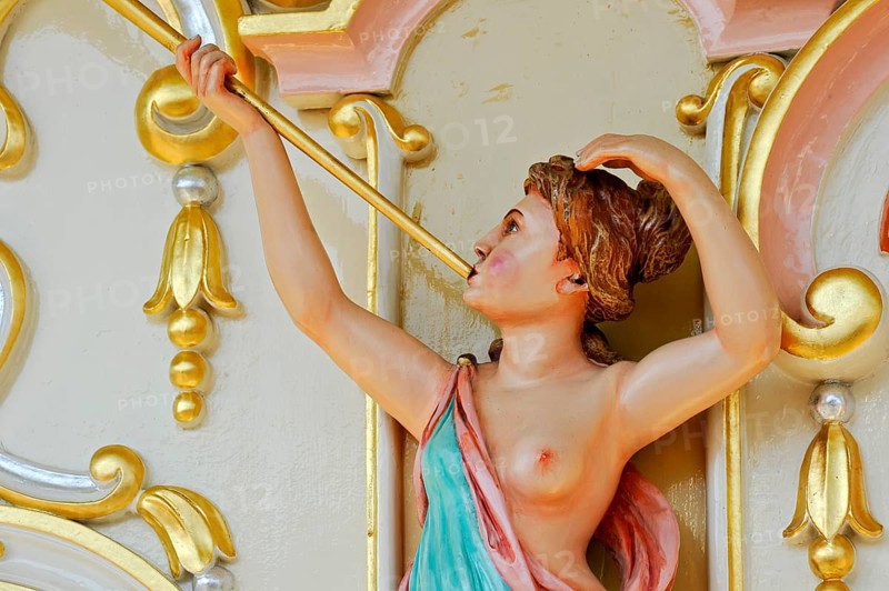 Wooden figure, colourfully painted, woman blowing fanfare, bosom free, old Hooghuys organ on carousel, fairground organ, historic Oktoberfest, Oktoberfest, Munich, Upper Bavaria, Bavaria, Germany, Europe