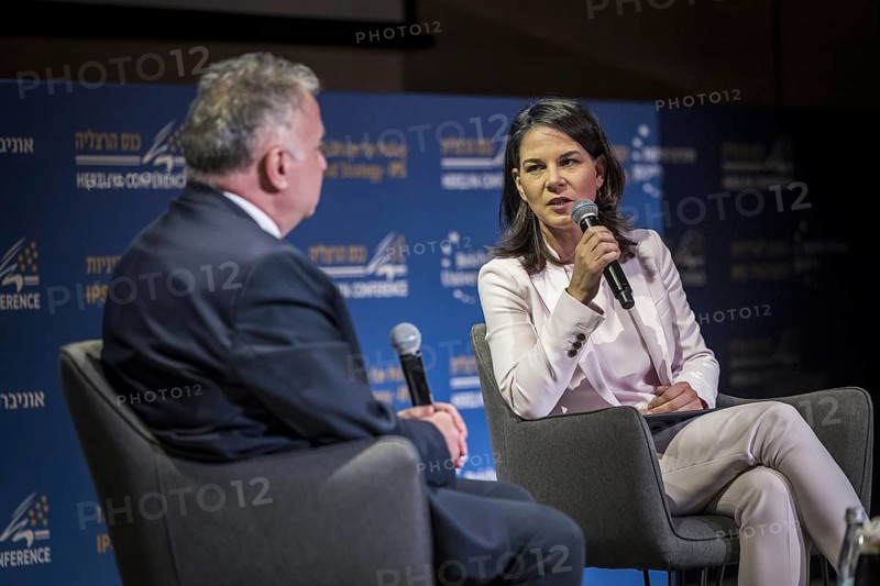 Annalena Bärbock (Alliance 90/The Greens), Federal Foreign Minister, photographed during her trip to Israel. Here taking part in the '21st Herzliya Conference, On the path of Strategic Surprises'. On stage with the former Israeli ambassador to the Federal Republic of Germany, Jeremy Issacharoff.