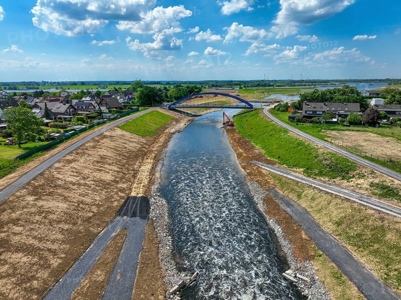 Dinslaken, Voerde, North Rhine-Westphalia, Germany, Renaturalisation of the Emscher. New Emscher estuary into the Rhine. Flood protection through land expansion. The mouth of the Emscher into the Rhine has been moved almost 500 metres north from Dinslaken to Voerde. Fish can now swim up the new Emscher from the Rhine through a newly created floodplain area without any barriers. Following the construction of a parallel sewer, the Emscher has been completely free of sewage since January 2022. The river was previously an open, above-ground combined sewer with rainwater and wastewater, Europe