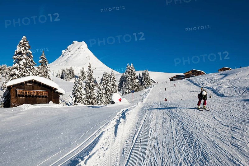 Snow-covered mountains and mountain hut with ski slope, Damülser Mittagspitze, Damüls, Bregenzerwald, Vorarlberg, Austria, Europe