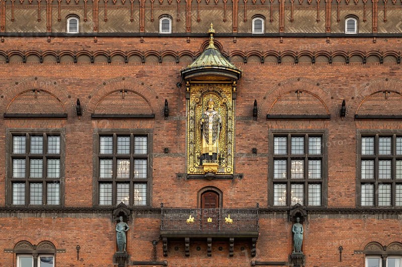 Brick façade with gilded sculpture of Bishop Absalon, Town Hall in the National Romantic style by Martin Nyrop, Town Hall Square, Rathausplatz or Rådhuspladsen, Copenhagen, Denmark, Europe