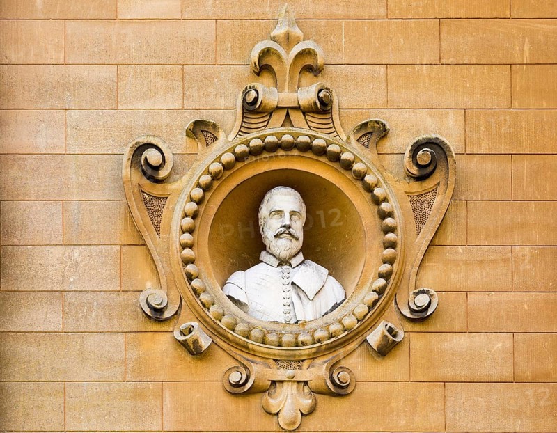 Holford family bust portrait in wall of Westonbirt House and School, Tetbury, Gloucestershire, England, UK