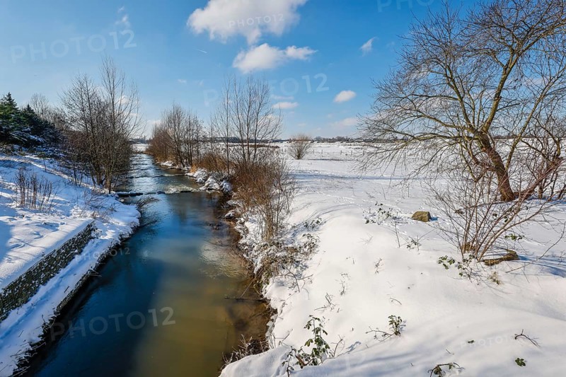 Hamm, North Rhine-Westphalia, Germany - Sunny winter landscape in the Ruhr area, ice and snow on the river Lippe, fish ladder, Lippe branch diversion