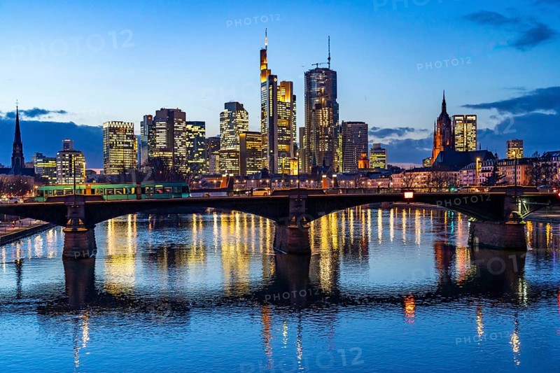 Skyline of the city centre of Frankfurt am Main, river Main, dusk, Ignatz-Bubis-Brücke, Hesse, Germany, Europe