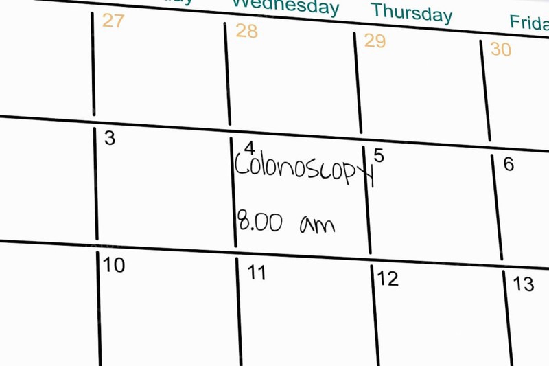 Symbolic image: Reminder of a colonoscopy in an appointment diary