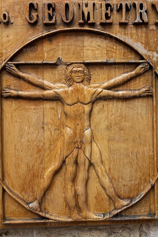 Close-up of Vitruvian man drawing by Leonardo da Vinci carved on a wooden plaque, Old Town of Kotor, Montenegro, Europe