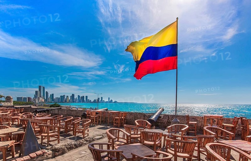 Street cafe in colonial Cartagena Walled City (Cuidad Amurrallada) overlooking scenic shoreline of Bocagrande and hotel zone