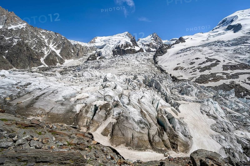 High alpine glaciated mountain landscape, La Jonction, Glacier des Bossons meets Glacier de Taconnaz, summit of Mont Maudit and Mont Blanc, Chamonix, Haute-Savoie, France, Europe