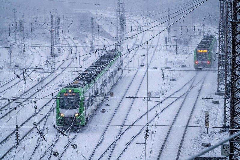 Winter weather, heavy snowfall, railway tracks in front of Essen main station, S-Bahn train, North Rhine-Westphalia, Germany, Europe