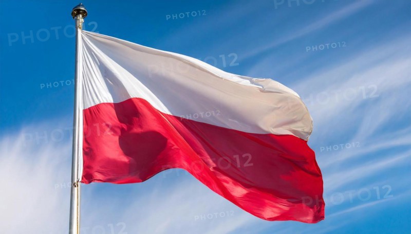 Flags, the national flag of Poland flutters in the wind