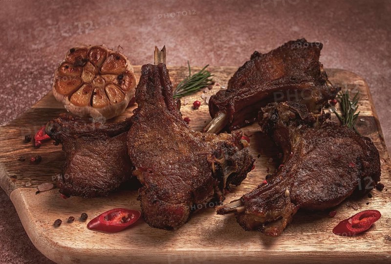 Fried veal ribs, with spices, baked in the oven, homemade, no people