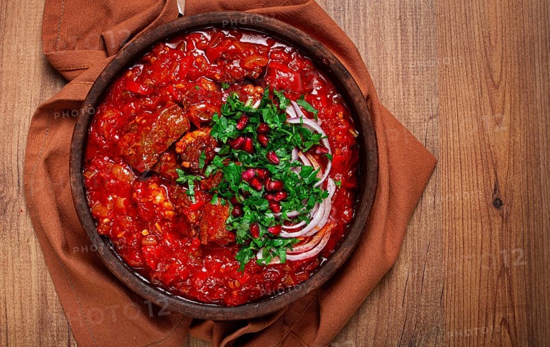 Chashushuli, a traditional Georgian dish, spicy, stewed meat with tomatoes and spices, homemade, no people