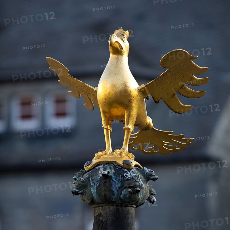 Gilded imperial eagle as a fountain eagle on the market fountain, Old Town, Goslar, UNESCO World Heritage Site, Lower Saxony, Germany, Europe
