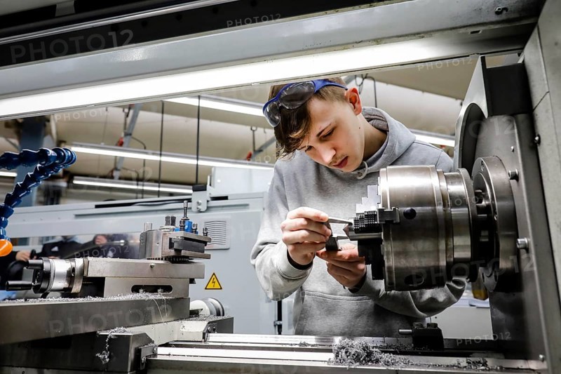 Remscheid, North Rhine-Westphalia, Germany - Trainees in metal professions, here at a machine tool, Vocational Training Centre of the Remscheid metal and electrical industry. - FOR EDITORIAL USE ONLY!