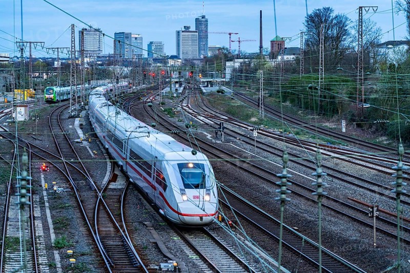 Train on the tracks west of Essen central station, skyline of the city centre, ICE train, North Rhine-Westphalia, Germany, Europe